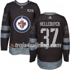 Winnipeg Jets tröja Connor Hellebuyck 37 1917-2017 100th Anniversary Adidas Svart Authentic - NHL Tröjor Herr